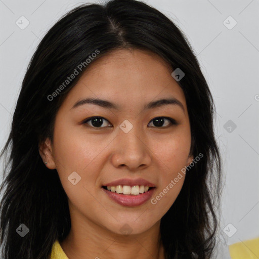 Joyful asian young-adult female with long  brown hair and brown eyes