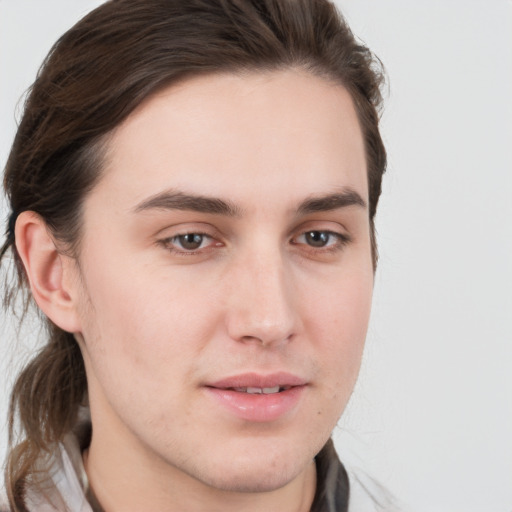 Joyful white young-adult male with medium  brown hair and brown eyes