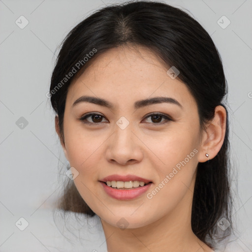 Joyful asian young-adult female with medium  brown hair and brown eyes