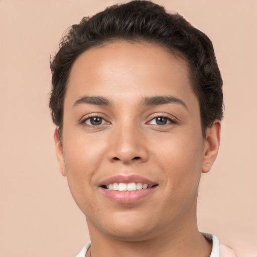 Joyful white young-adult female with short  brown hair and brown eyes