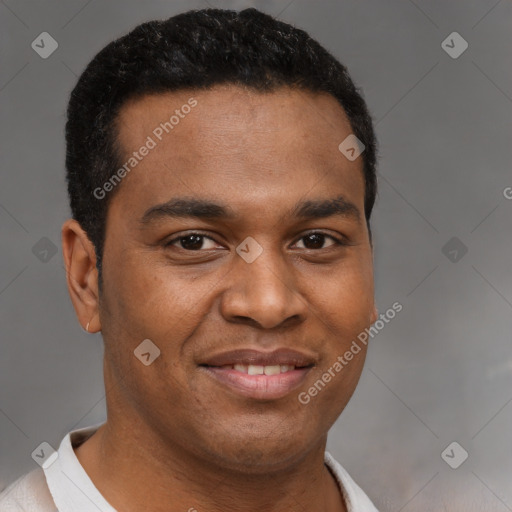 Joyful latino young-adult male with short  brown hair and brown eyes