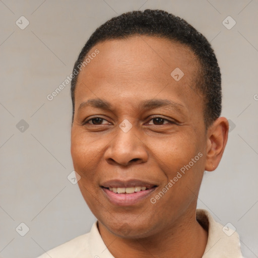 Joyful latino adult male with short  black hair and brown eyes