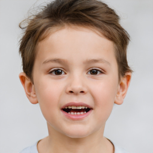 Joyful white child male with short  brown hair and brown eyes