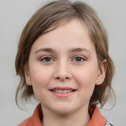 Joyful white child female with medium  brown hair and grey eyes