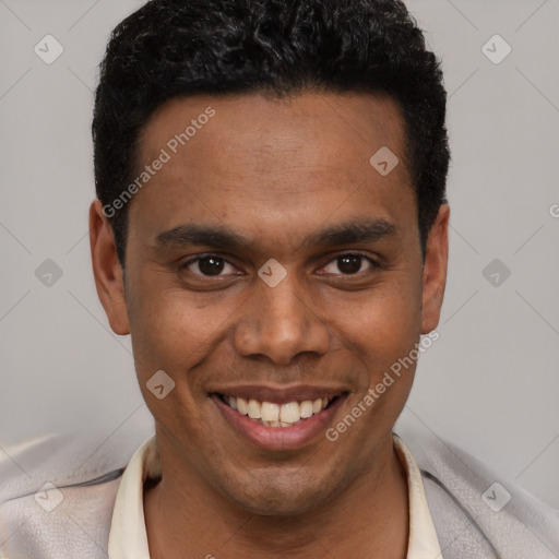 Joyful white young-adult male with short  black hair and brown eyes