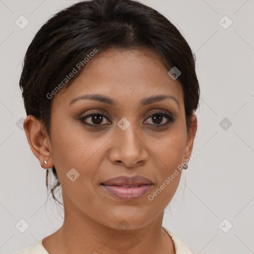 Joyful latino young-adult female with medium  brown hair and brown eyes