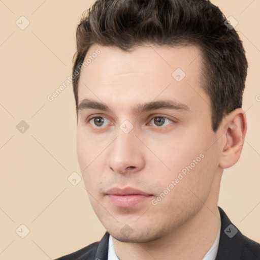 Neutral white young-adult male with short  brown hair and brown eyes