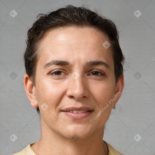 Joyful white adult female with short  brown hair and brown eyes