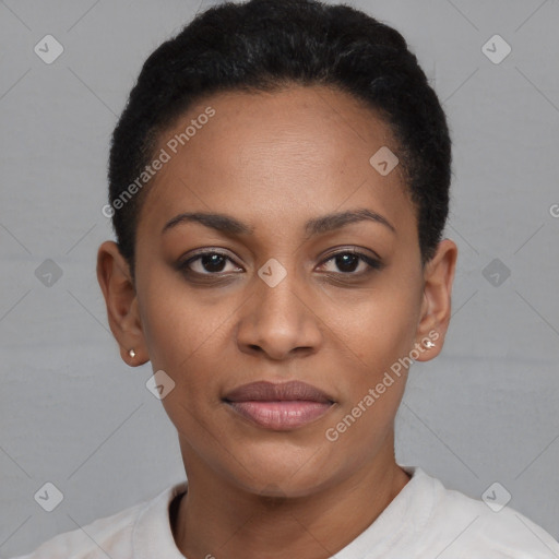 Joyful black young-adult female with short  black hair and brown eyes