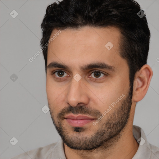 Neutral white young-adult male with short  black hair and brown eyes