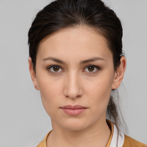 Neutral white young-adult female with medium  brown hair and brown eyes