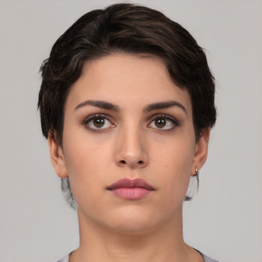 Neutral white young-adult female with short  brown hair and brown eyes