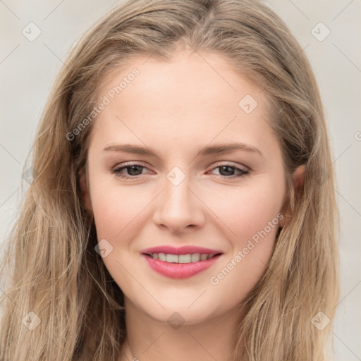 Joyful white young-adult female with long  brown hair and grey eyes