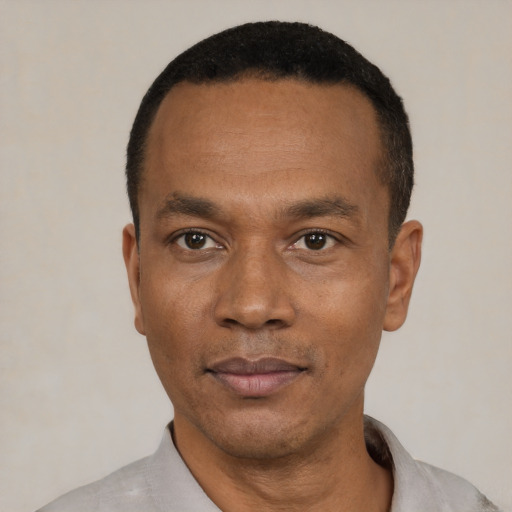 Neutral black adult male with short  black hair and brown eyes