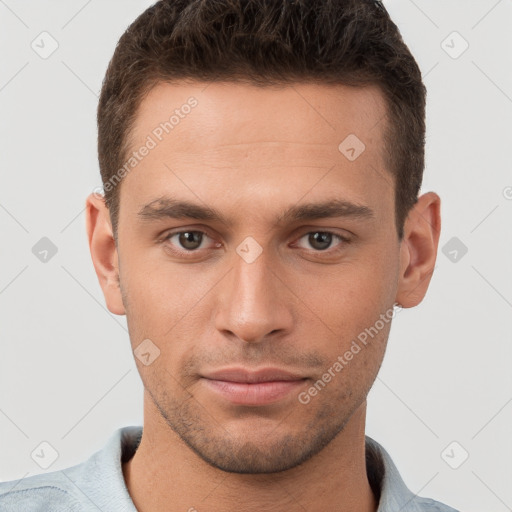 Neutral white young-adult male with short  brown hair and brown eyes