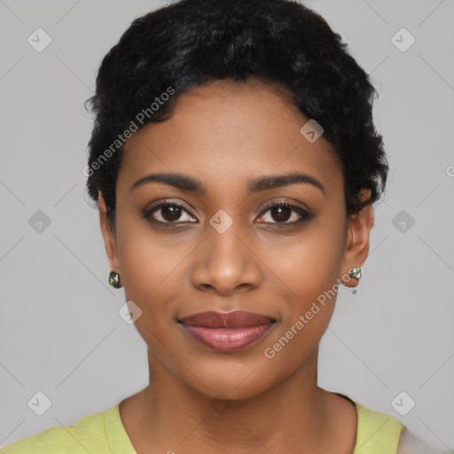 Joyful black young-adult female with short  black hair and brown eyes