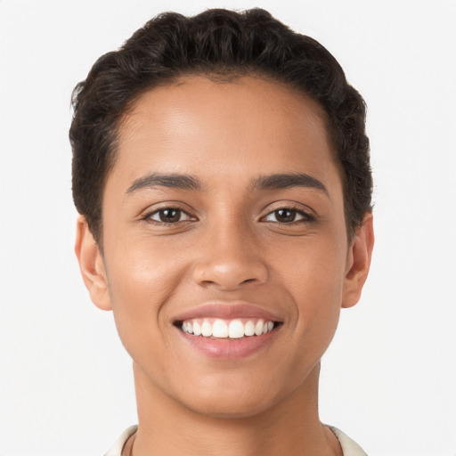 Joyful latino young-adult female with short  brown hair and brown eyes