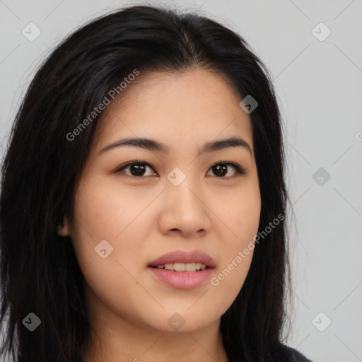 Joyful asian young-adult female with long  brown hair and brown eyes