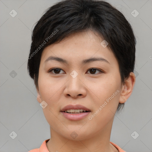 Joyful asian young-adult female with short  brown hair and brown eyes