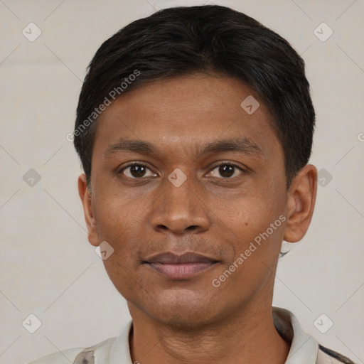 Joyful asian young-adult male with short  black hair and brown eyes