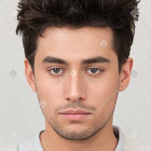 Neutral white young-adult male with short  brown hair and brown eyes