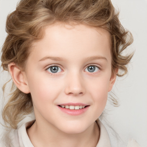 Joyful white child female with medium  brown hair and blue eyes