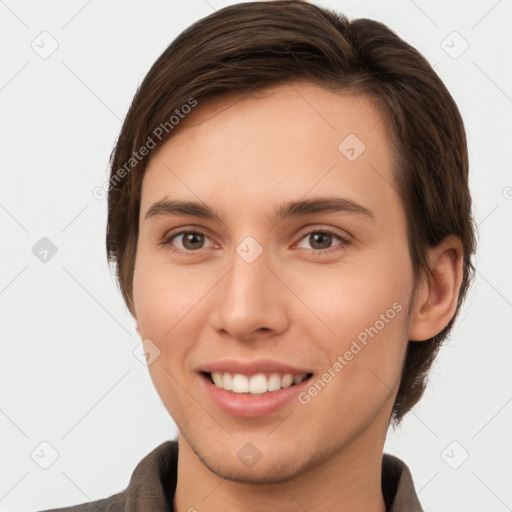 Joyful white young-adult female with short  brown hair and brown eyes