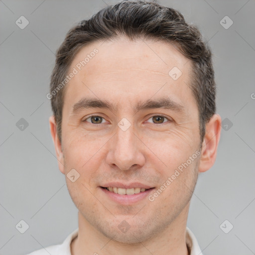 Joyful white adult male with short  brown hair and brown eyes