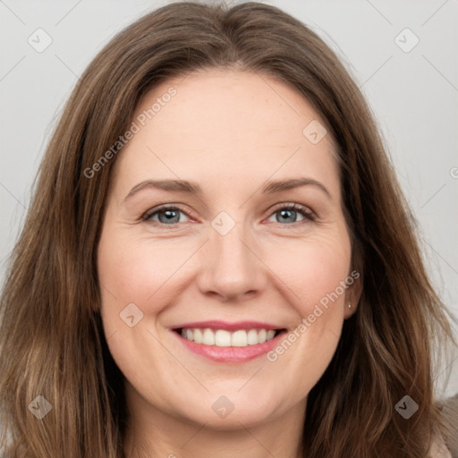 Joyful white young-adult female with long  brown hair and grey eyes