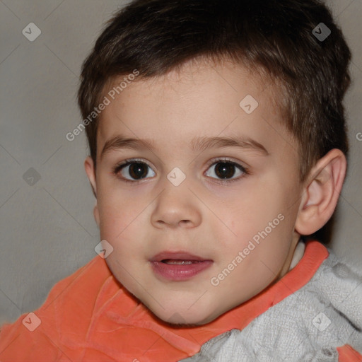 Joyful white child male with short  brown hair and brown eyes