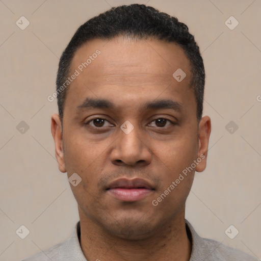 Neutral latino young-adult male with short  black hair and brown eyes