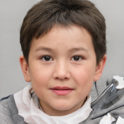 Joyful white child female with short  brown hair and brown eyes