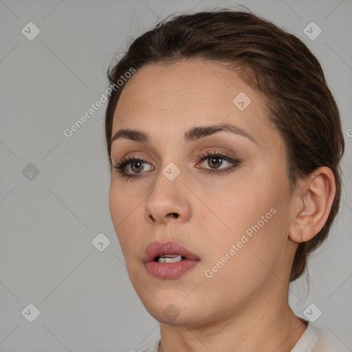 Neutral white young-adult female with medium  brown hair and brown eyes