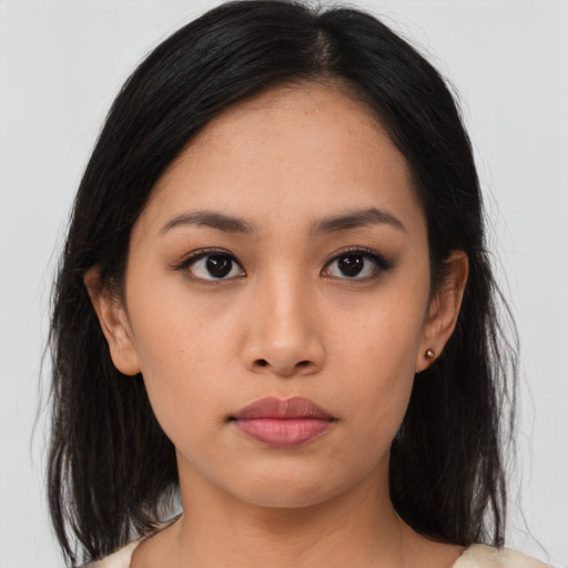 Neutral asian young-adult female with medium  black hair and brown eyes