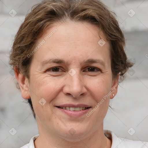 Joyful white adult female with short  brown hair and brown eyes