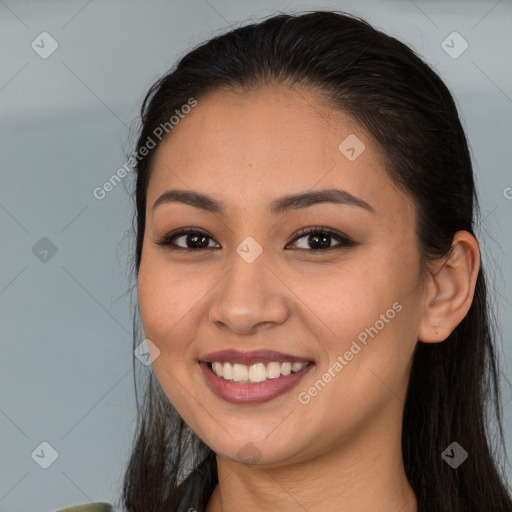 Joyful white young-adult female with long  brown hair and brown eyes