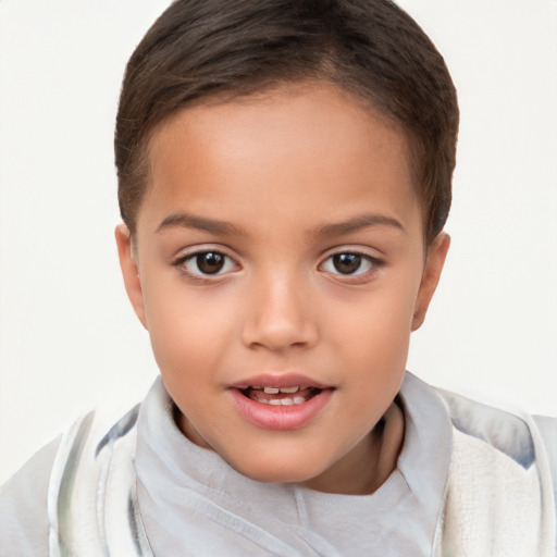 Joyful white child female with short  brown hair and brown eyes