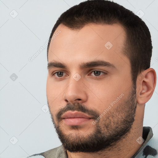 Neutral white young-adult male with short  black hair and brown eyes