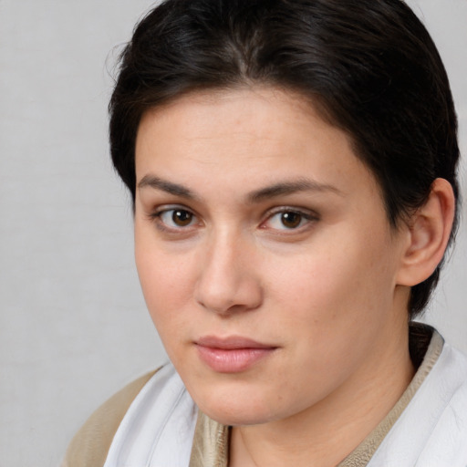 Neutral white young-adult female with medium  brown hair and brown eyes