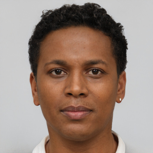 Neutral black young-adult female with short  brown hair and brown eyes