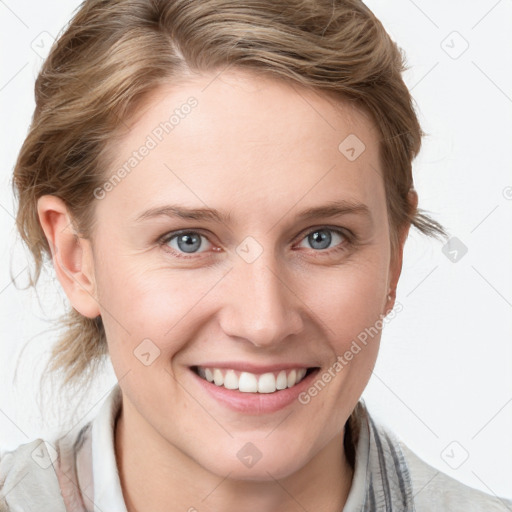 Joyful white young-adult female with medium  brown hair and blue eyes