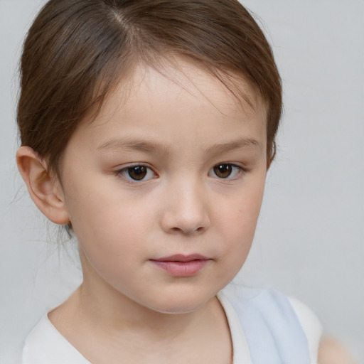 Neutral white child female with short  brown hair and brown eyes