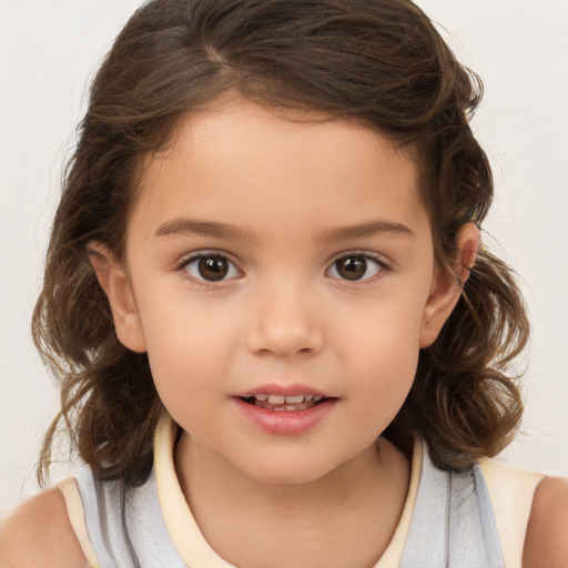 Joyful white child female with medium  brown hair and brown eyes