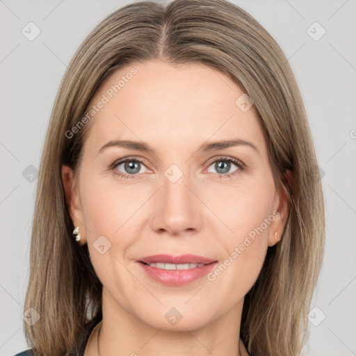 Joyful white adult female with medium  brown hair and grey eyes