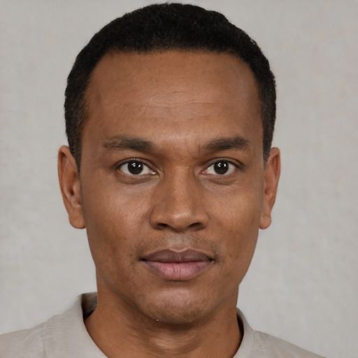Neutral black young-adult male with short  black hair and brown eyes