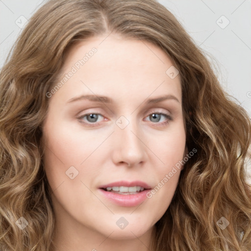 Joyful white young-adult female with long  brown hair and blue eyes