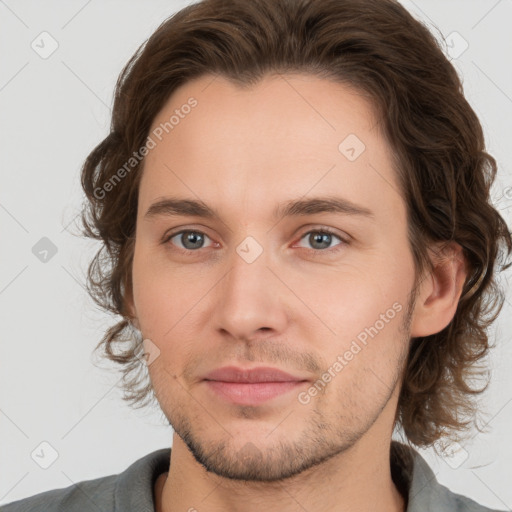 Joyful white young-adult male with medium  brown hair and brown eyes