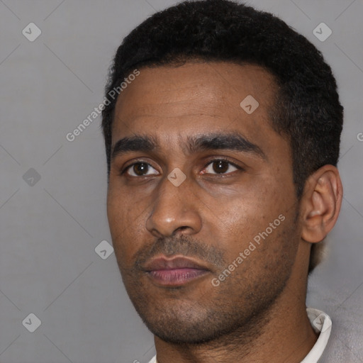 Neutral black young-adult male with short  black hair and brown eyes