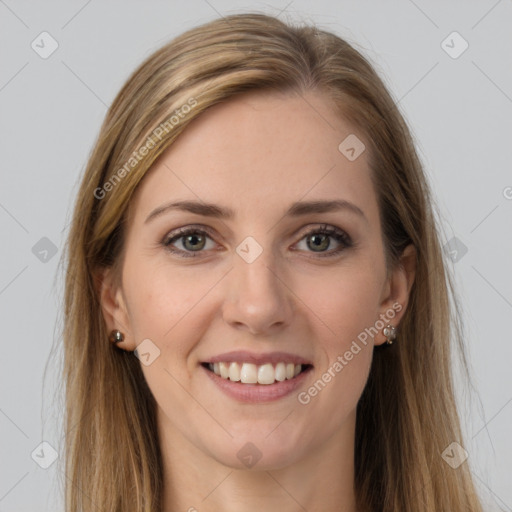 Joyful white young-adult female with long  brown hair and grey eyes