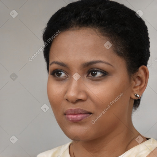 Joyful black young-adult female with short  brown hair and brown eyes